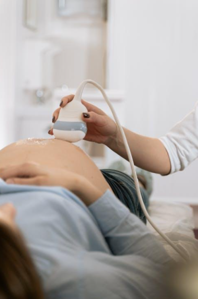 Picture of a woman having a pregnancy scan.